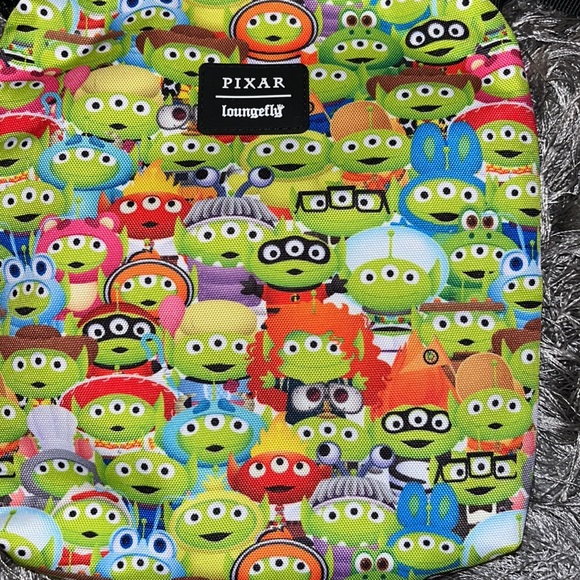 NWT Loungefly Toy Story Alien Outfits AOP Passport Bag - Picture 3 of 5